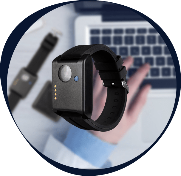 A photo showing an actigraph watch above a person.
