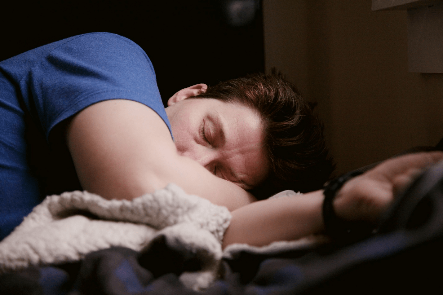 A man sleeping in bed