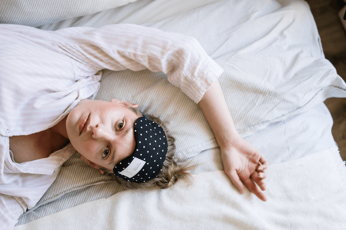 Woman lying awake in bed