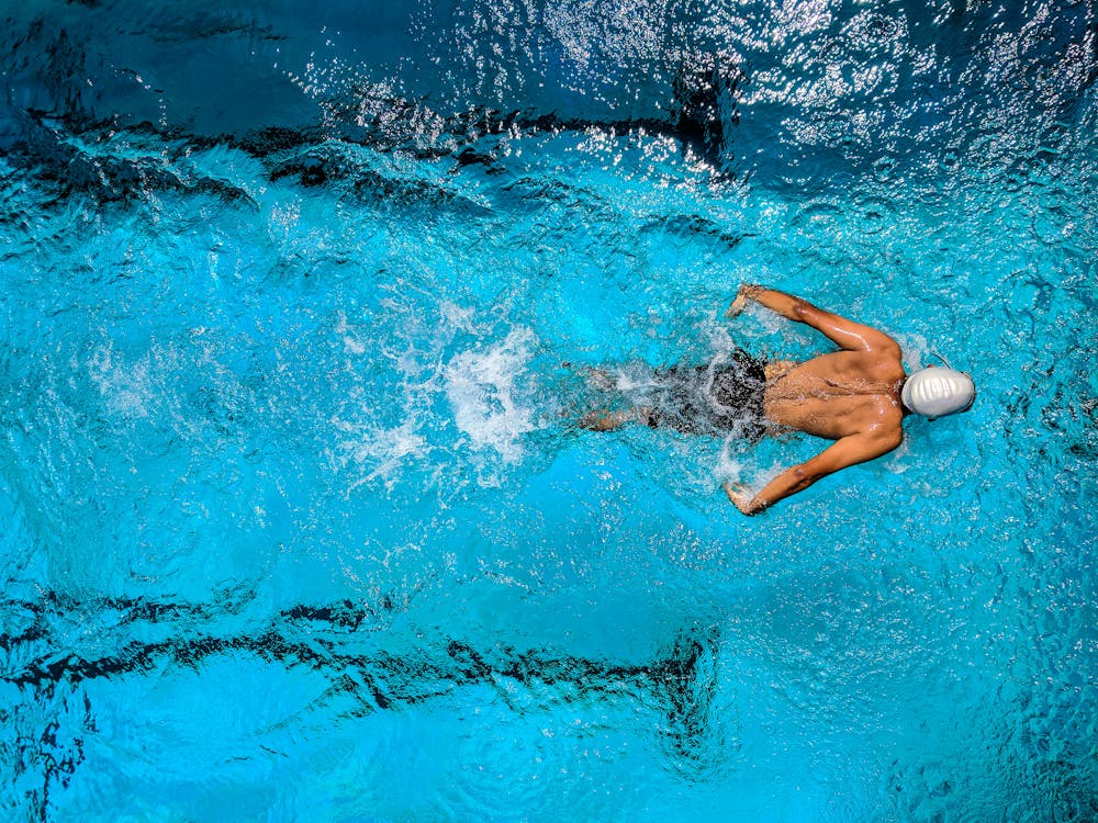 An athlete swimming in a pool