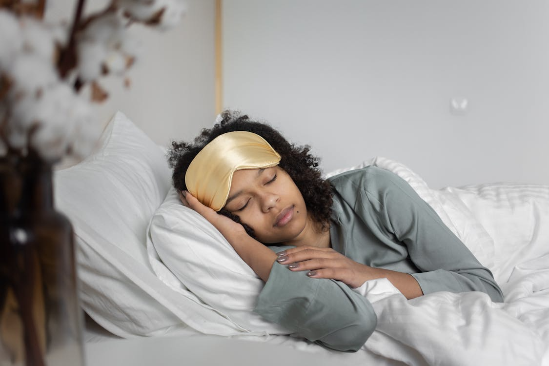 A woman sleeping in bed