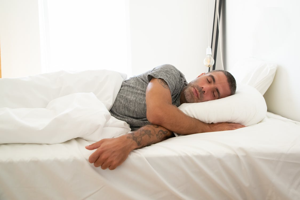 A man sleeping in bed