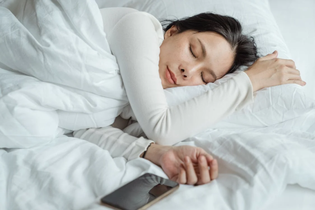 A woman sleeping in bed